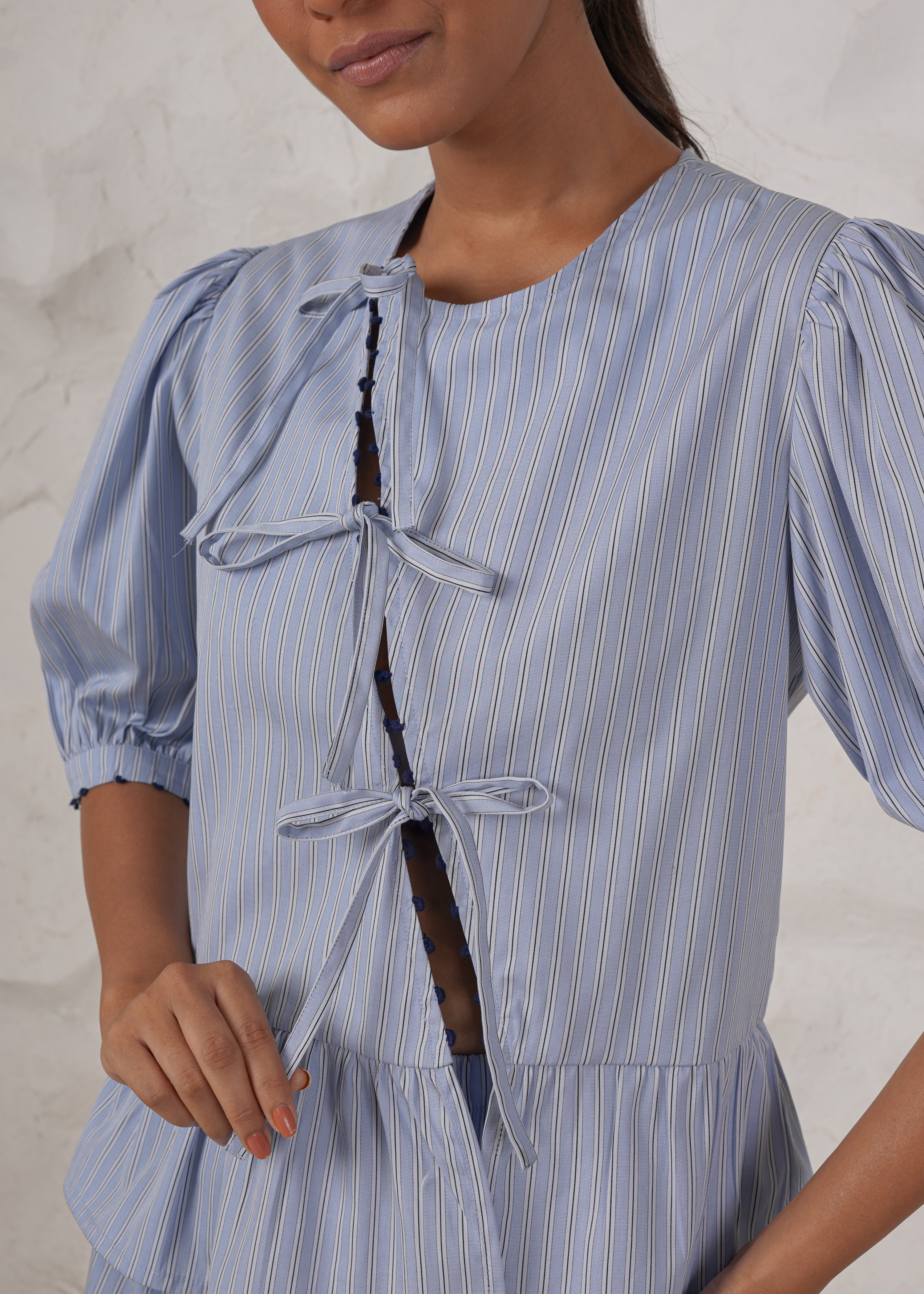 Lily Asymmetric Peplum Tie Blouse